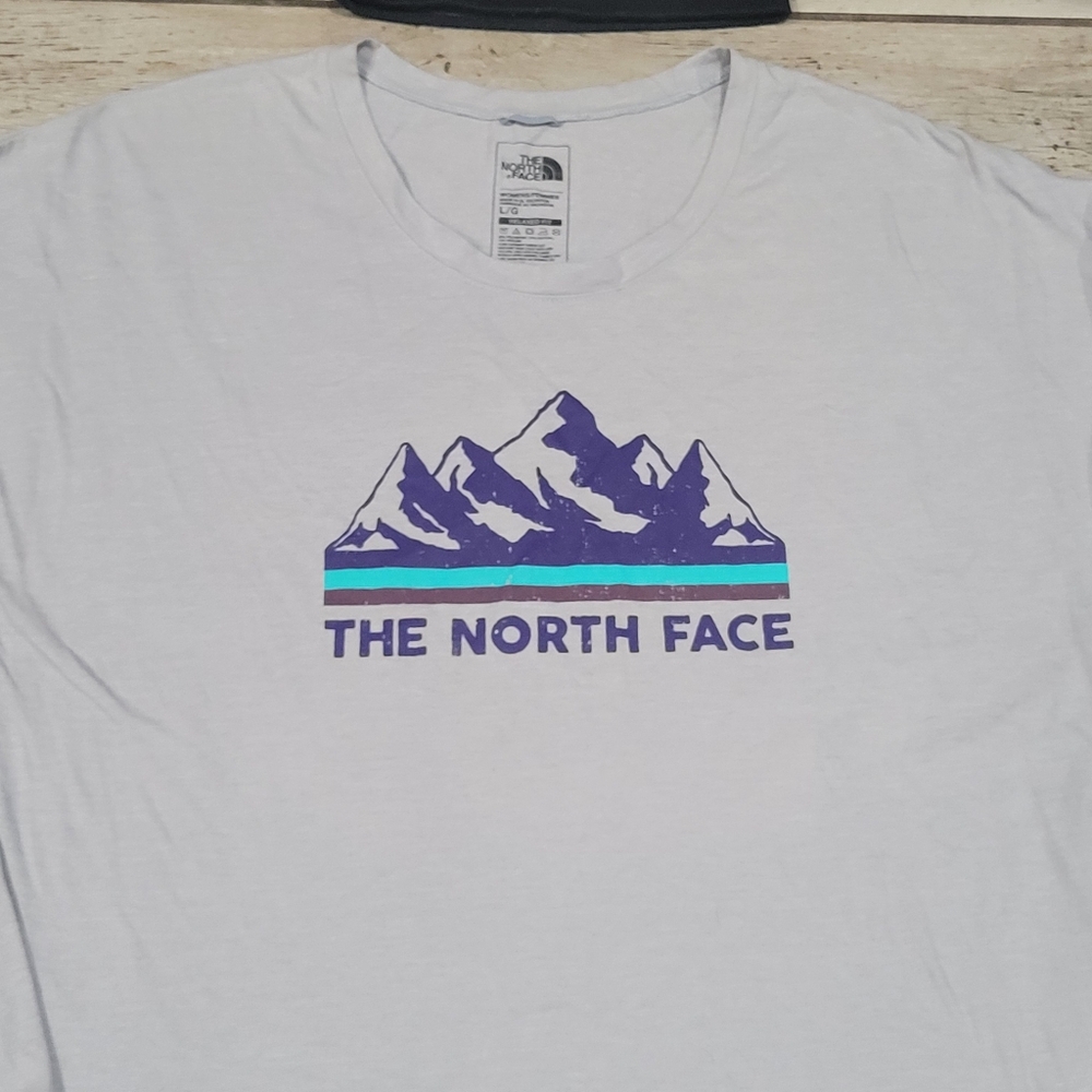 The North Face bundle top womens Lg relaxed fit and binnie winter cap